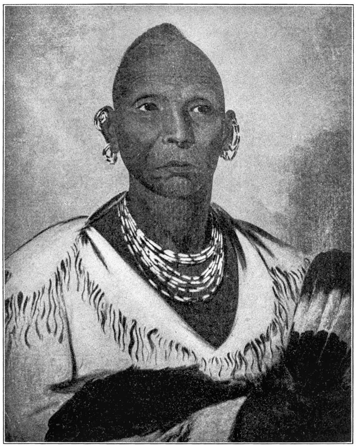 Portrait of Black Hawk, shown wearing several necklaces as well as numerous earrings which are in both ears.