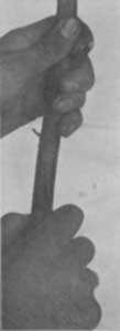 Fig. 3. Second operation. Making vertical cut between
parallel cuts on stock.