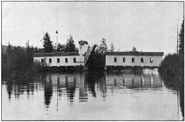 COVERED WOOD DRAWBRIDGE
ON THE COLUMBIA RIVER HIGHWAY IN CLATSOP COUNTY, OVER THE JOHN DAY RIVER
EAST OF ASTORIA. BUILT IN 1918. LIFT SPAN&mdash;40 FEET