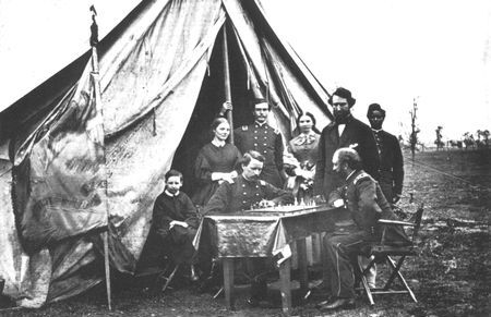 Chess, a favorite pastime in camp, finds Colonel Martin McMahon, General
Sedgwick's adjutant, engaged in the contest that was a favorite of Napoleon and
many other military leaders.
