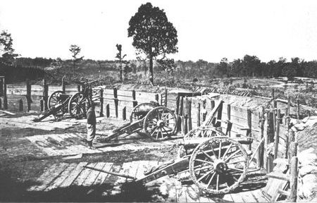 Confederate sappers constructed a number of artillery emplacements covering the
avenues of approach to Atlanta. The guns in this fortification overlook famous
Peachtree Street.