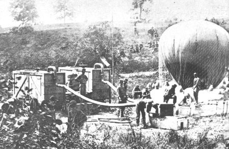 Balloon observation on the battlefield was made possible by the portable gas generator.
Here Professor T.S.C. Lowe's balloon is inflated by mobile generators in
front of Richmond in 1862.